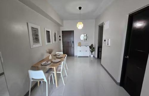 Bagumbayan Apartment | Modern Comfort & Snap Worthy with Pool, Gym & More