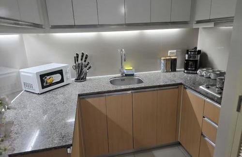 Bagumbayan Apartment | Modern Comfort & Snap Worthy with Pool, Gym & More