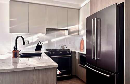 Hastings Condo | Modern Condo in East Vancouver with Sunset Views - Above a Bakery!