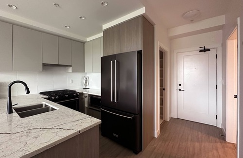 Hastings Condo | Modern Condo in East Vancouver with Sunset Views - Above a Bakery!