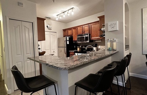 Sarasota Condo | Modern condo in resort style gated community with large pool, gym, tennis, bbq.