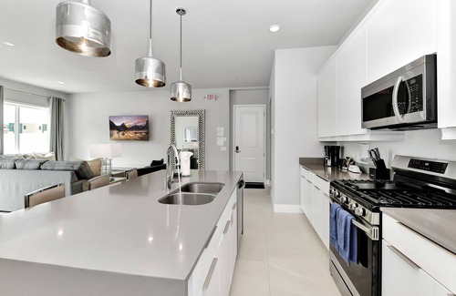 Reunion House | Modern Condo with Large Outdoor Patio. Reunion Resort Water Park Access near Disney at Spectrum Resort Orlando by Rentyl – B9 #138
