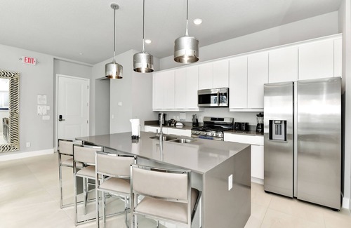 Reunion House | Modern Condo with Large Outdoor Patio. Reunion Resort Water Park Access near Disney at Spectrum Resort Orlando by Rentyl – B9 #138