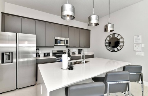 Reunion House | Modern Condo with Large Outdoor Patio. Reunion Resort Water Park Access near Disney at Spectrum Resort Orlando by Rentyl – B9 #136
