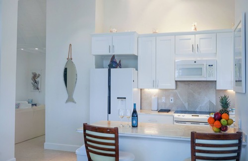 Ocean Point Villa | Modern Cottage with Chalk Sound Views