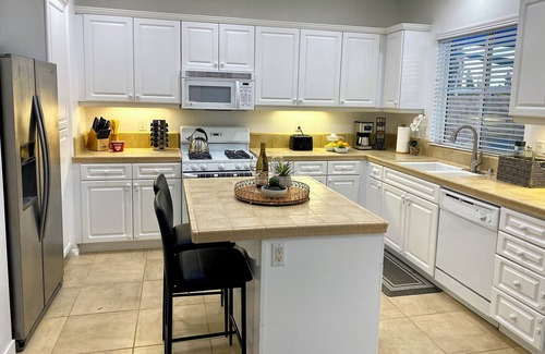 Midway House | Modern cozy comforts 4BR 2.5BA home, 2-car garage, outdoor space, monthly rental