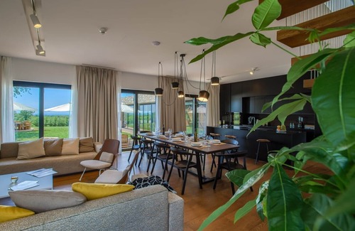 Porec Villa | Modern-designed villa with indoor-outdoor pool in Istria surrounded by nature on a large property which ensures privacy.