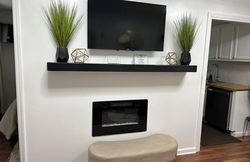 Fayetteville Apartment | Modern, fully equipped studio with separate sleeping area in Fayetteville.