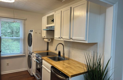 Fayetteville Apartment | Modern, fully equipped studio with separate sleeping area in Fayetteville.