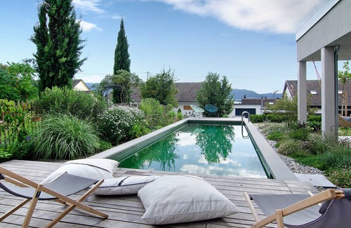 Ludwigshafen Apartment | Modern Holiday Apartment With Heated Natural Pool, Sauna, Terrace and WiFi; Parking lots available