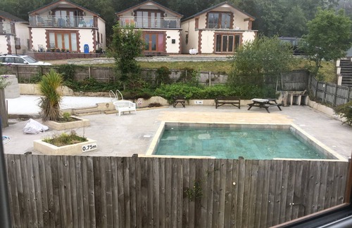 High Bickington House | Modern Holiday House with a View over the Taw valley & a Shared Pool. Free WiFi