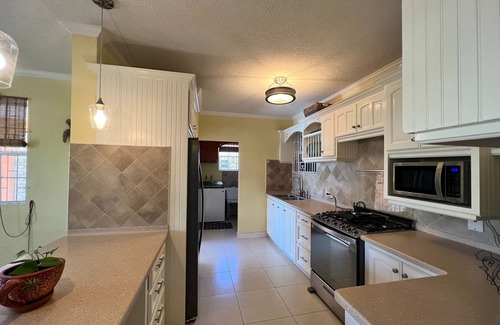 Oistins House | Modern Home Close to Beach, Oistins, Surfing. Secondary Rental on Premises.