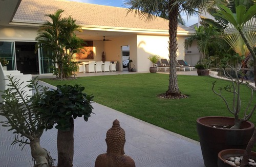 Ban Nong Sadao Villa | Modern luxury villa with large saltwater pool, jacuzzi and tropical garden