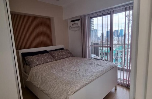 Kapitolyo Apartment | Modern Muji themed 2-bedroom condo