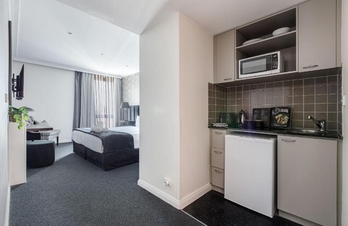Chinatown Apartment | Modern Nomads Classic Styled King Studio with Indoor Pool