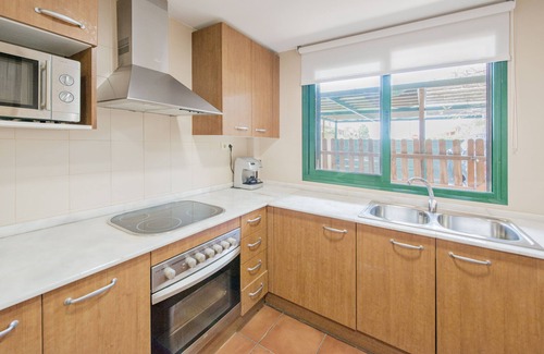 L Almadrava Condo | Modern Oasis by the sea. Luxurious urb with pool