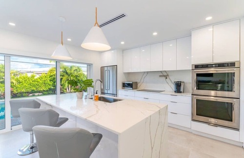Imperial Point House | Modern Oasis With Heated Pool Quick Drive To Beach