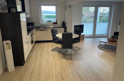 Ponitz am See Apartment | Modern, relaxing vacation apartment (2 pers) directly on the lake, sub board + bicycles