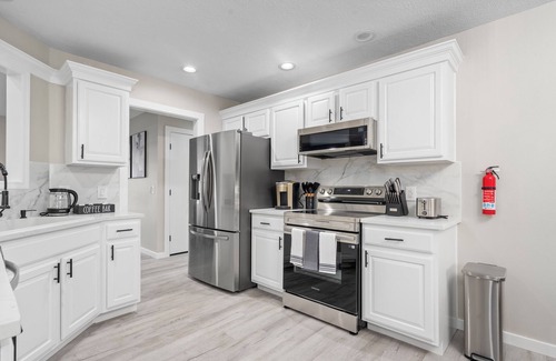 Springfield House | Modern Retreat w/Hot Tub, Game Room & King Suite! & More