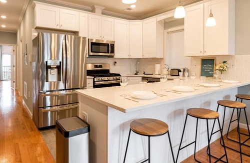 Hackensack River Waterfront Condo | Modern Retreat with Private Backyard, 30 Min ride to NYC