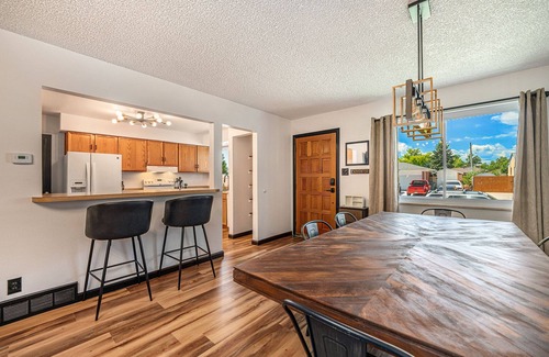 Northglenn House | Modern Retreat with a Cozy Fit Pit Patio
