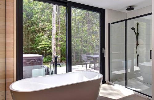Lac Superieur Village Ski Chalet | Modern Scandinavian Chalet with Jacuzzi, Pool, Lake