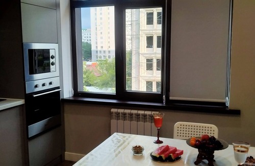 Sverdlov District Apartment | Modern & spacious, cozy balcony to mountains from Bishkek Center.