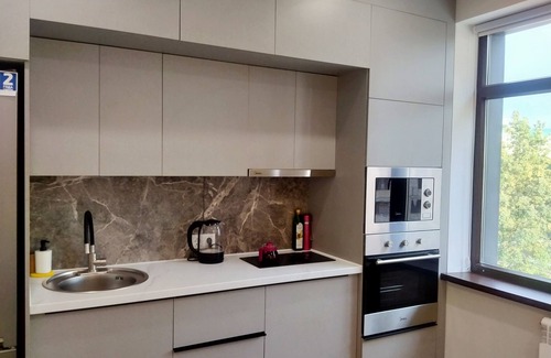Sverdlov District Apartment | Modern & spacious, cozy balcony to mountains from Bishkek Center.