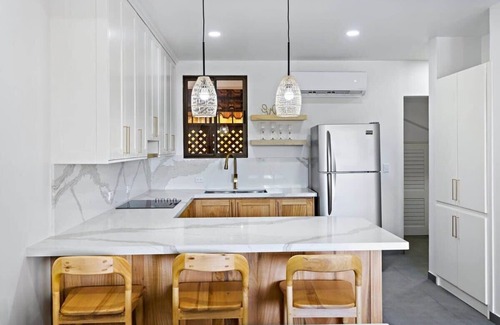 Coco Sunset Hills Apartment | Modern Split-Level 2-Bedroom Condo with Pools, Terrace & Easy Beach Access