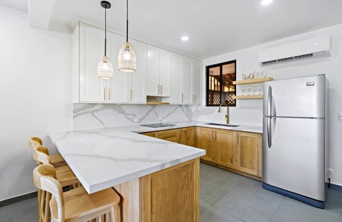Coco Sunset Hills Apartment | Modern Split-Level 2-Bedroom Condo with Pools, Terrace & Easy Beach Access