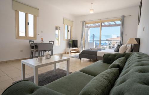 Peyia Town Apartment | Modern Studio with Pool and Balcony Hillside and Sea Views For Business or Leisure Travellers