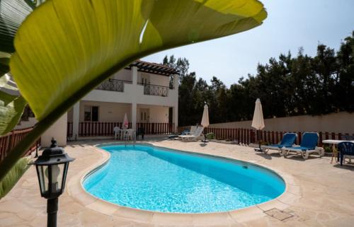 Peyia Town Apartment | Modern Studio with Pool and Balcony Hillside and Sea Views For Business or Leisure Travellers