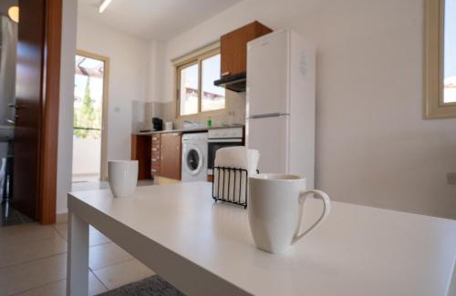 Peyia Town Apartment | Modern Studio with Pool and Balcony Hillside and Sea Views For Business or Leisure Travellers