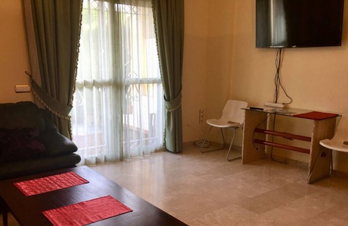 Benalmadena Costa Ski Chalet | Modern terraced house 650 m from the beach. Communal swimming pool. a / c