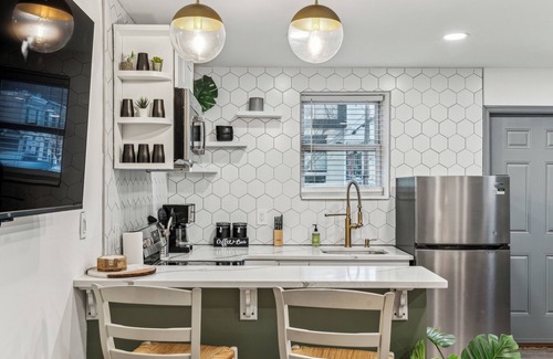Kensington House | Modern Two Bedroom Family Retreat, Fireplace outside of Fishtown