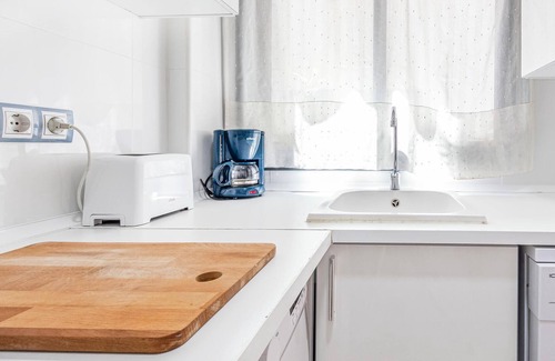 La Envia Apartment | Modern vacation apartment near a golf course.