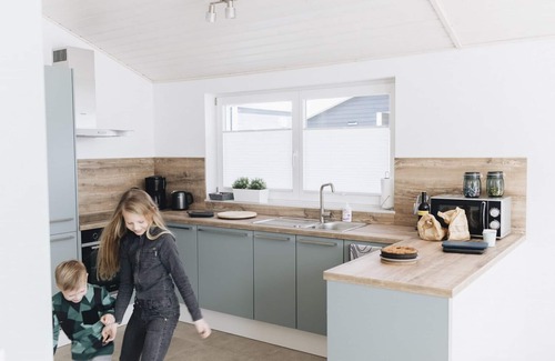 Nordhorn House | Modern vacation home with sauna and whirlpool in an idyllic waterside location