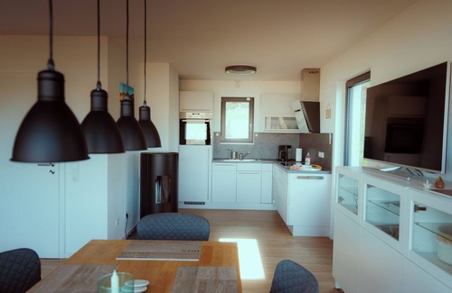 Bringhausen House | Modern vacation home with wonderful lake view, sauna and 5 min. walk to the lake