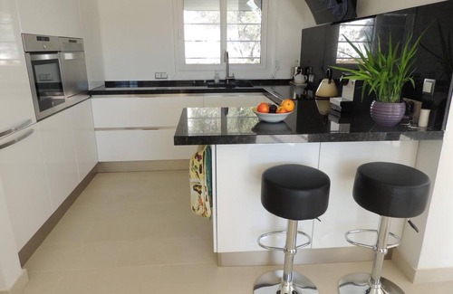 El Mas Fumats Villa | Modern villa with stunning views over the Bay of Roses