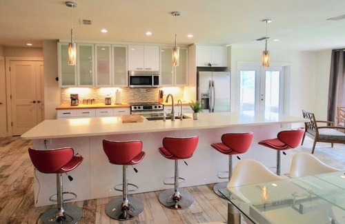 Flor-a-mar House | Modern Waterfront Home with Hot Tub, Dock, Kayaks