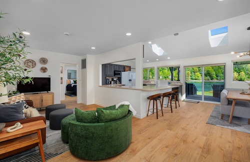 Matlock House | Modern Waterfront Escape with Grill, Patio, and Nature Views