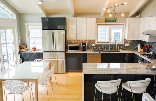 South Bethany Harbor House | Modern Waterfront Home with boat access and a short walk to the beach