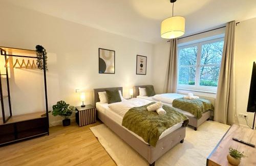 Norderstedt Apartment | Moderne 2-Zimmer-Whg - Nähe Bahnhof mit Balkon und Stellplatz - 2 Smart-TV