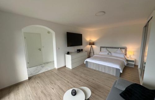 Buchenberg Apartment | Modernes Apartment mit 180° Bergblick
