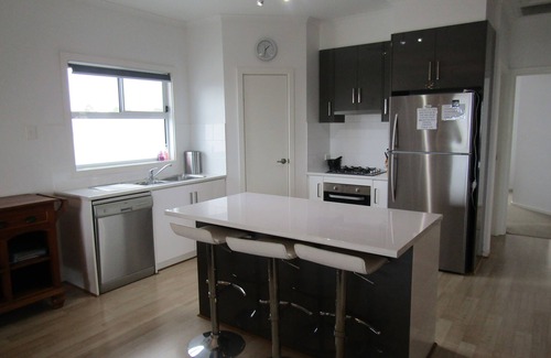 Dalrymple House | Moonlight Escape - Beautiful Holiday Home with sea views from balcony!