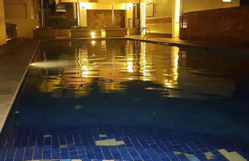 Pinagsama Apartment | Morgan Suite BGC across5 Venice Canal Mall free Pool gym
