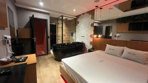 Zona Leste Hotel | Motel Jardim Secreto