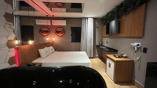 Zona Leste Hotel | Motel Jardim Secreto