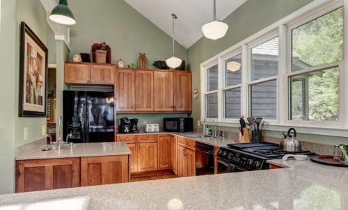 Big Canoe House | Mountain Acres Retreat - Relax by the wood fireplace and more