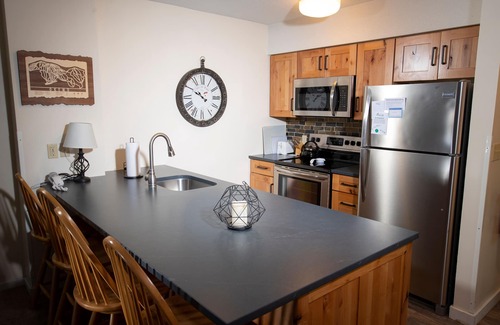 Ludlow House | Mountain Lodge At Okemo-1br Fireplace & Updated Kitchen 1 Bedroom Condo by RedAwning